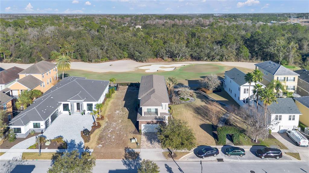 7580 Excitement Drive Reunion, FL 34747 - Photo 42 of 47 an aerial view of a house with a yard