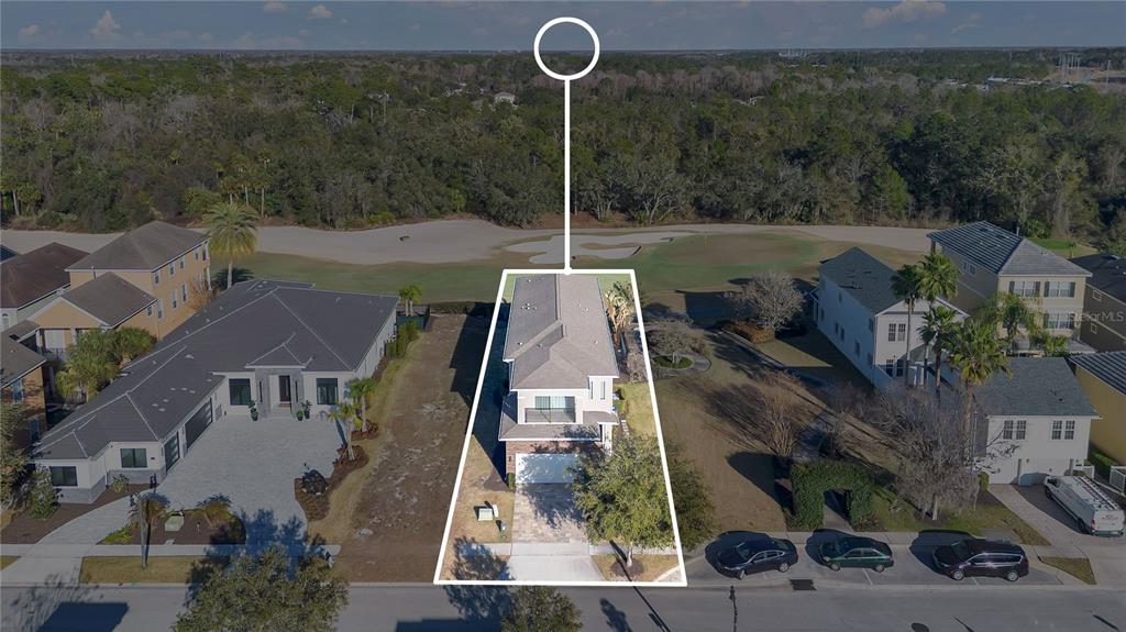 7580 Excitement Drive Reunion, FL 34747 - Photo 45 of 47 a aerial view of a house with a yard