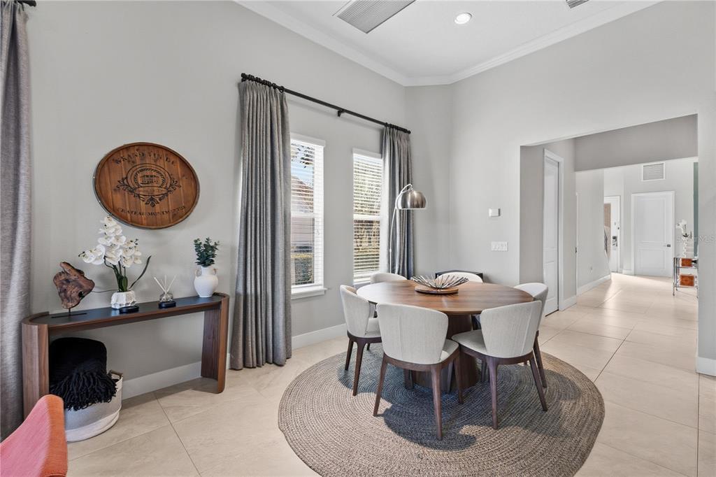 7580 Excitement Drive Reunion, FL 34747 - Photo 5 of 47 a view of a dining room with furniture