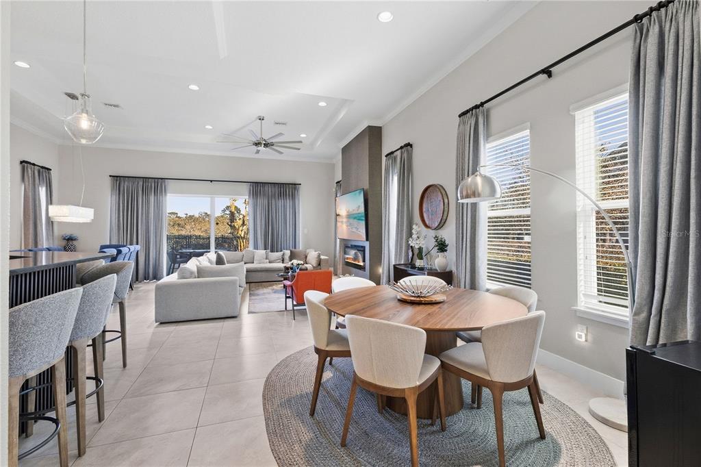 7580 Excitement Drive Reunion, FL 34747 - Photo 9 of 47 a dining room with furniture and window