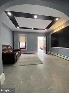 a view of a hallway with kitchen