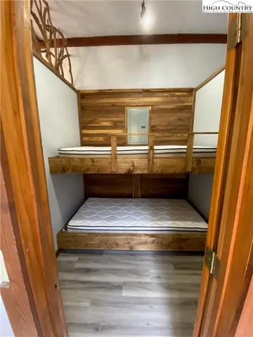 a bathroom with a sink mirror vanity and a toilet