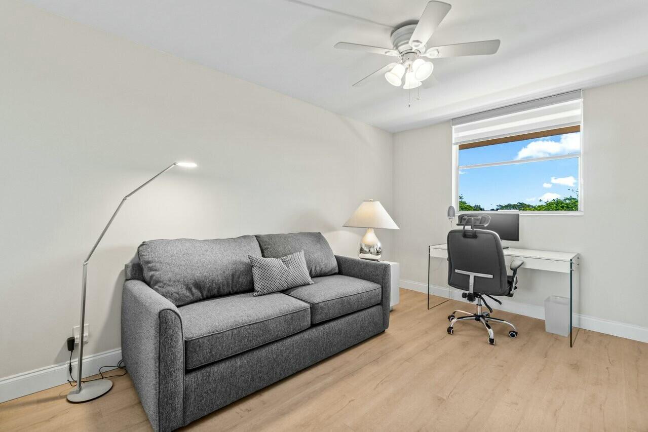 6461 Northwest 2nd Avenue, Unit 411 Boca Raton, FL 33487 - Photo 20 of 34 a living room with furniture