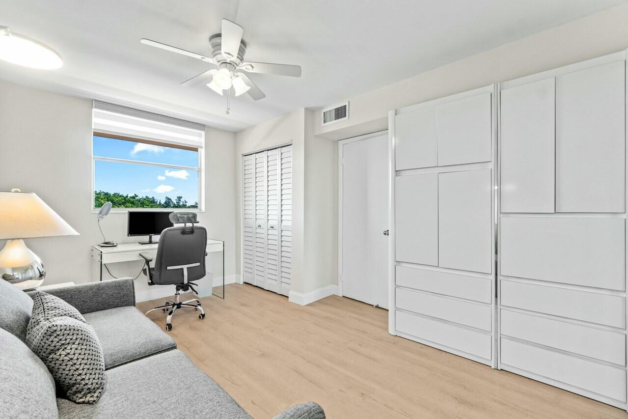 6461 Northwest 2nd Avenue, Unit 411 Boca Raton, FL 33487 - Photo 21 of 34 a living room with furniture