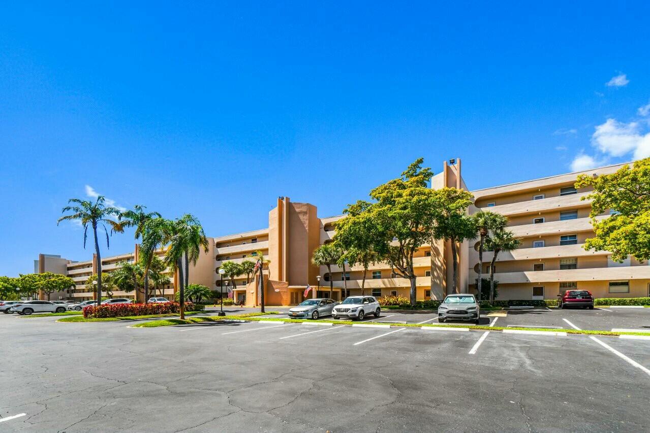 6461 Northwest 2nd Avenue, Unit 411 Boca Raton, FL 33487 - Photo 32 of 34 a view of a city with tall buildings