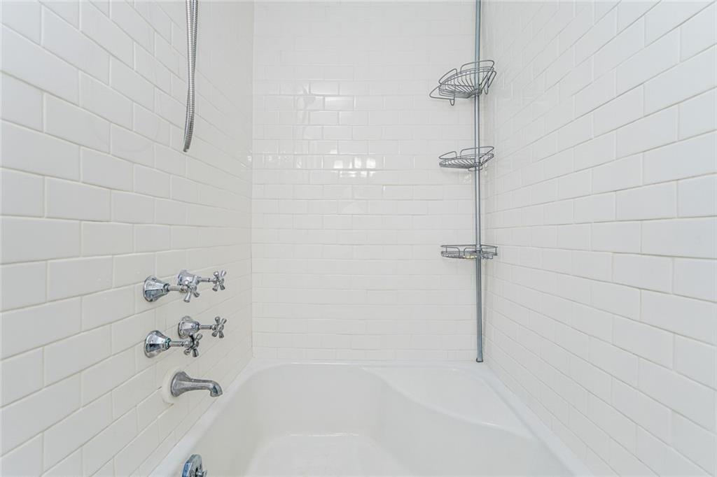 9437 Shore Road, Unit B9 Brooklyn, NY 11209 - Photo 14 of 22 a bathroom with a shower