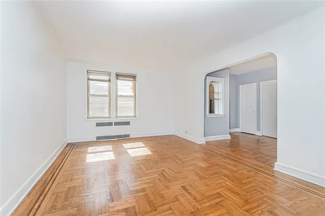 a view of an empty room and window