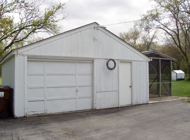 3645 Flossmoor Road Homewood, IL 60422 - Photo 9 of 10 a house with white door of garage