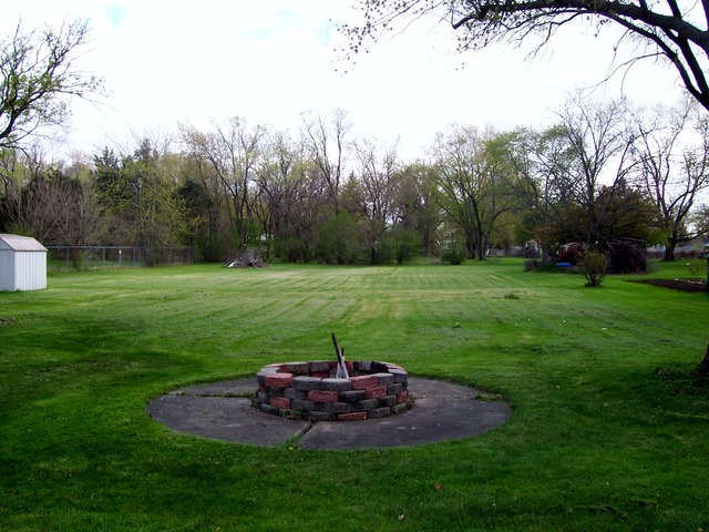 3645 Flossmoor Road Homewood, IL 60422 - Photo 10 of 10 a view of a garden with large trees