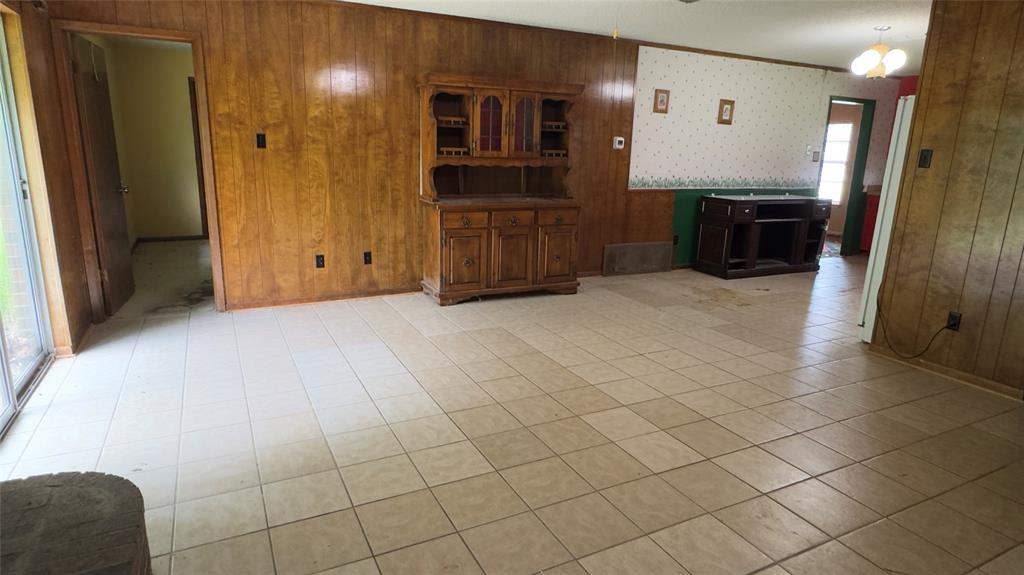 415 Meadowlark Trail Springtown, TX 76082 - Photo 10 of 35 a view of a refrigerator and an entryway in a room