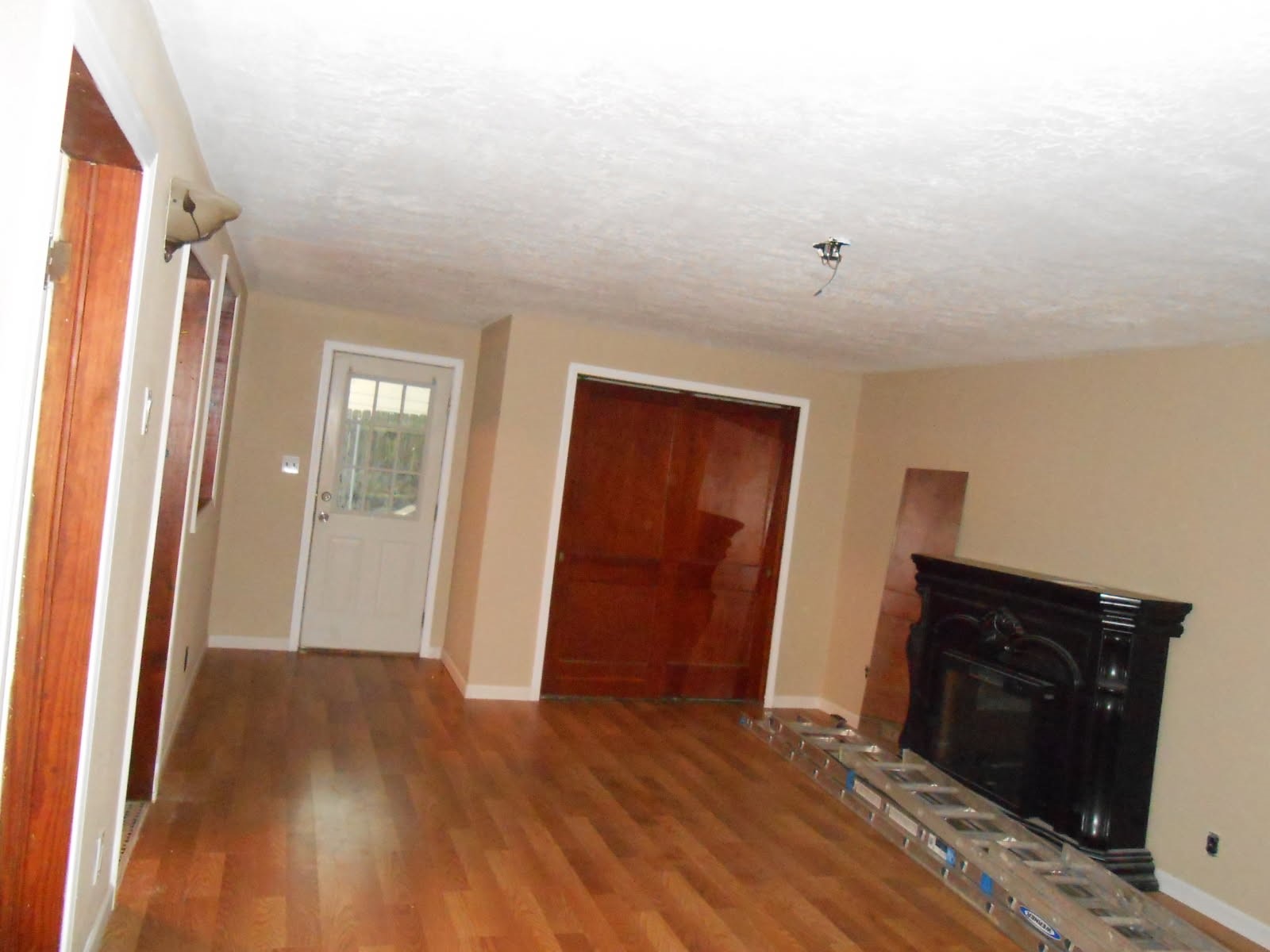 1050 Boyd Street Beaumont, TX 77705 - Photo 4 of 9 wooden floor in an empty room
