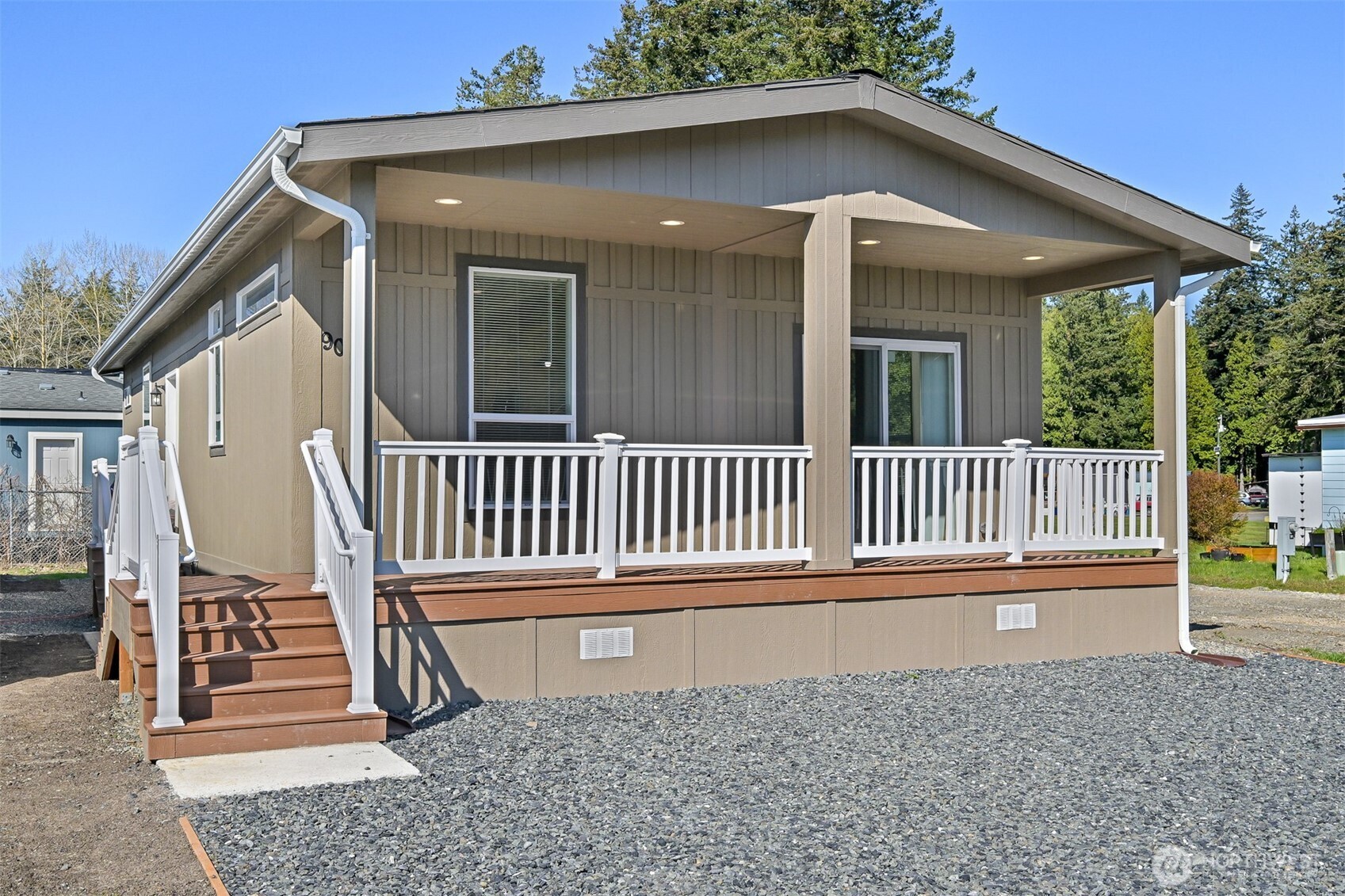 4672 Birch Bay Lynden Road, Unit 90 Blaine, WA 98230 - Photo 1 of 13 front view of a house with a porch
