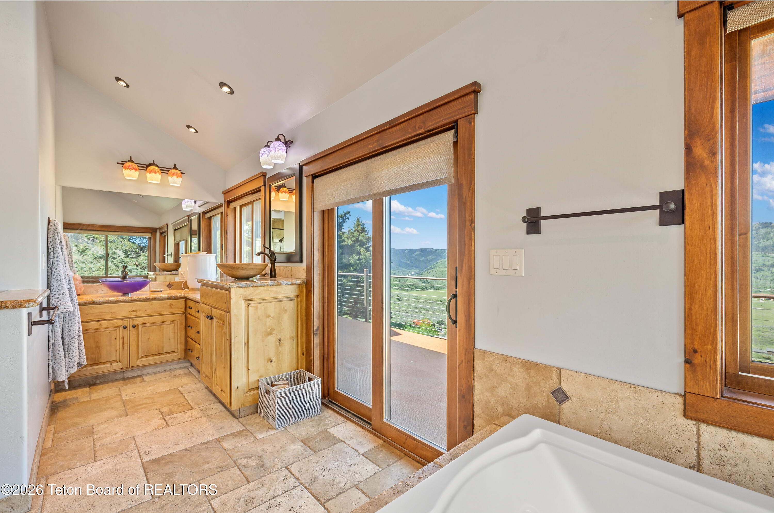 2490 La Bonte Road Jackson, WY 83001 - Photo 19 of 50 Bathroom Deck Door