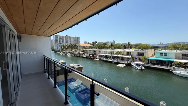 a view of swimming pool from a balcony