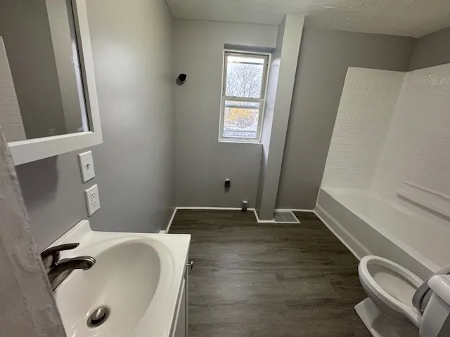 a bathroom with a sink and a tub