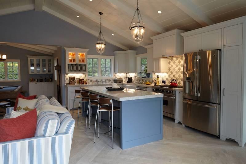 14 Flood Circle Atherton, CA 94027 - Photo 17 of 29 a kitchen with stainless steel appliances kitchen island granite countertop a refrigerator a stove a sink a dining table and chairs with wooden floor