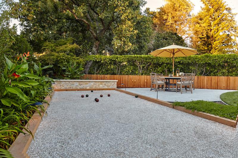 14 Flood Circle Atherton, CA 94027 - Photo 22 of 29 a backyard of a house with table and chairs