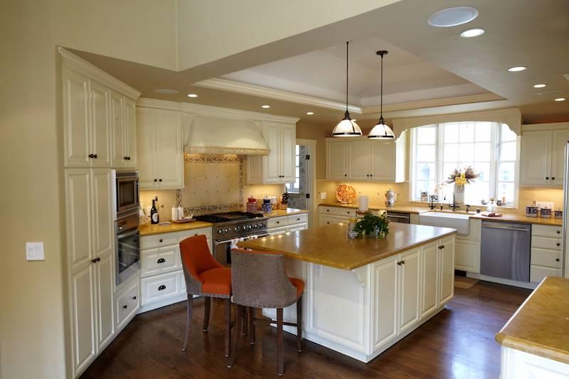 14 Flood Circle Atherton, CA 94027 - Photo 6 of 29 a kitchen with a dining table chairs sink and cabinets