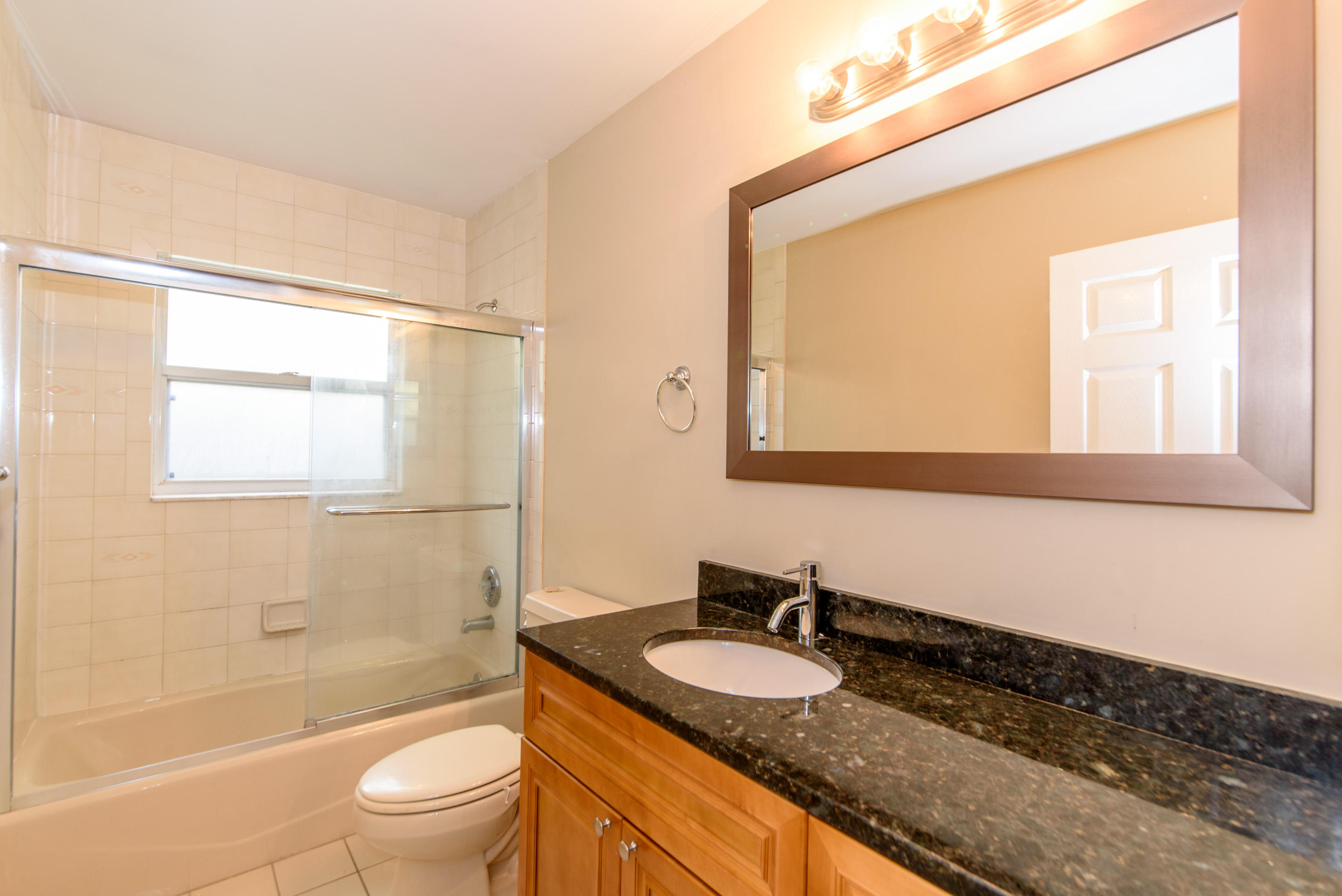 6373 Foster Street Jupiter, FL 33458 - Photo 12 of 18 Guest Bathroom