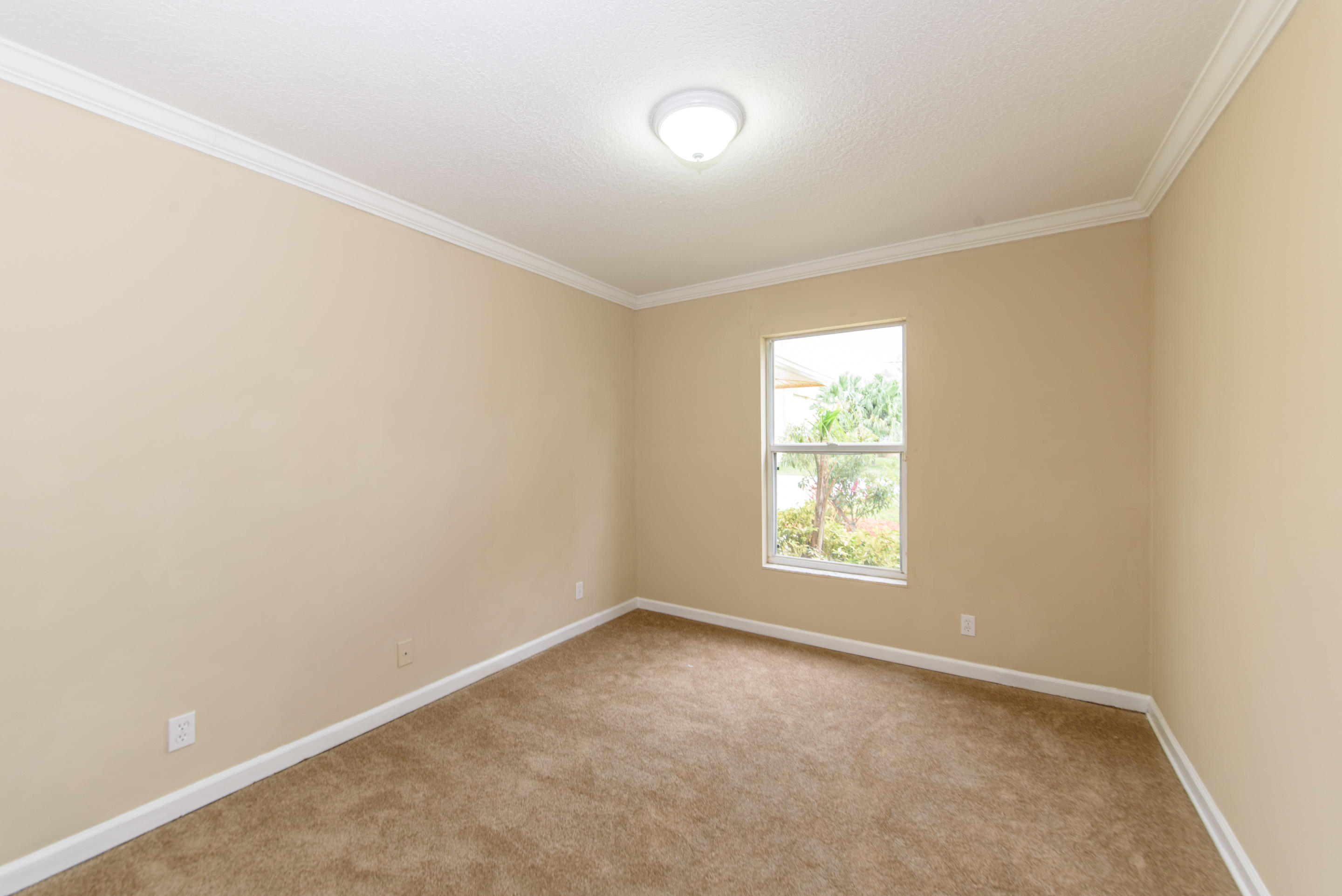 6373 Foster Street Jupiter, FL 33458 - Photo 14 of 18 Guest Bedroom