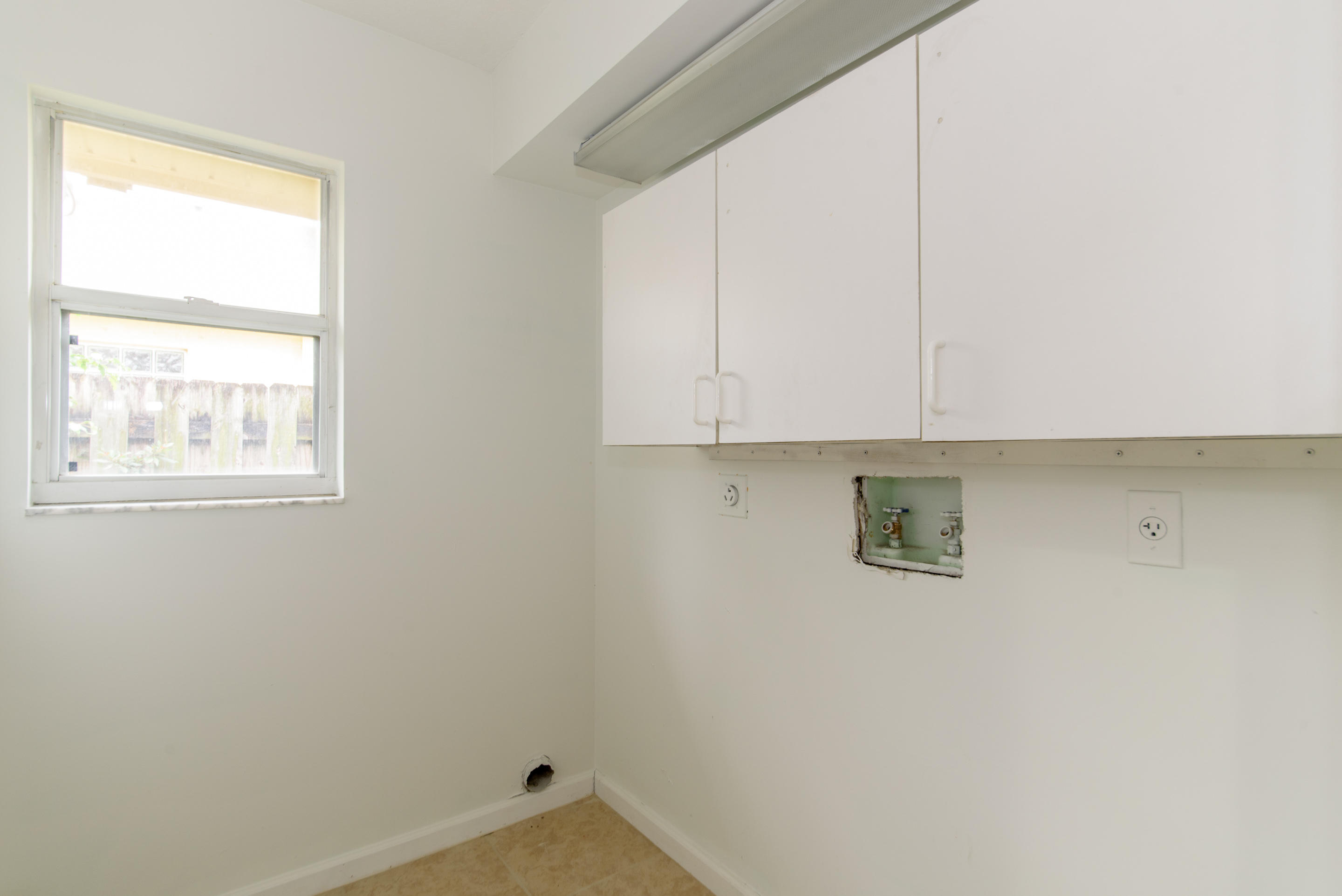 6373 Foster Street Jupiter, FL 33458 - Photo 15 of 18 Laundry Room