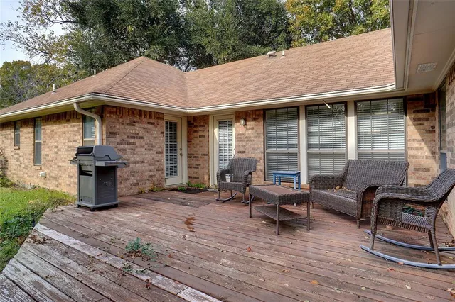 a backyard of a house with seating space