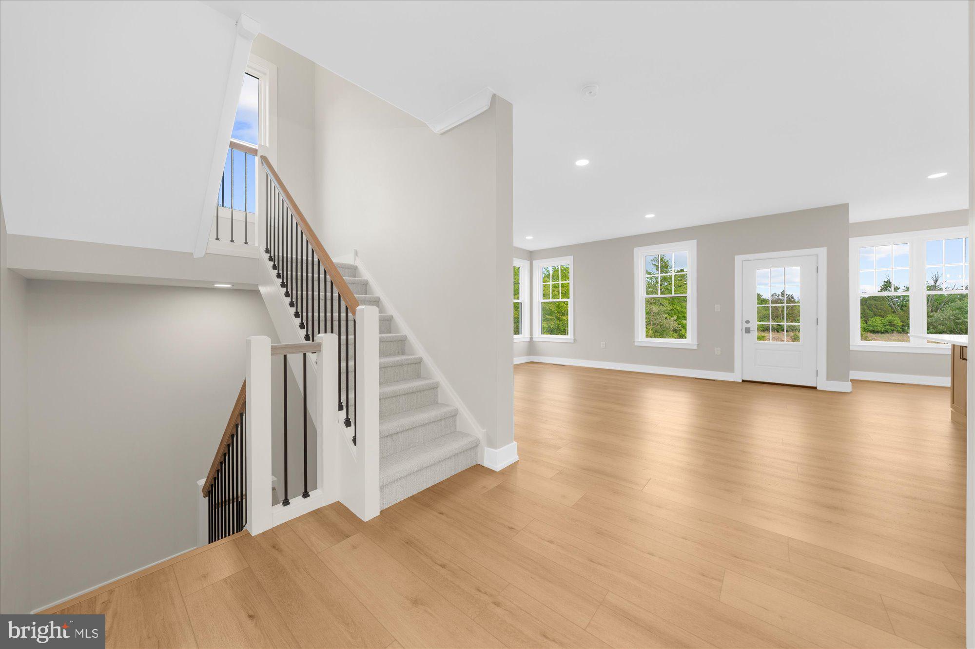 394 Renninger Road Perkiomenville, PA 18074 - Photo 15 of 41 a view of a room with wooden floor and windows