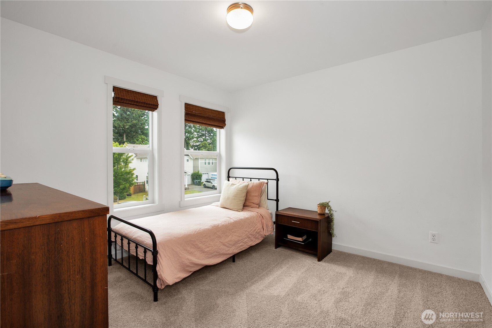 1344 Foreman Road DuPont, WA 98327 - Photo 21 of 40 a bedroom with a bed and a window