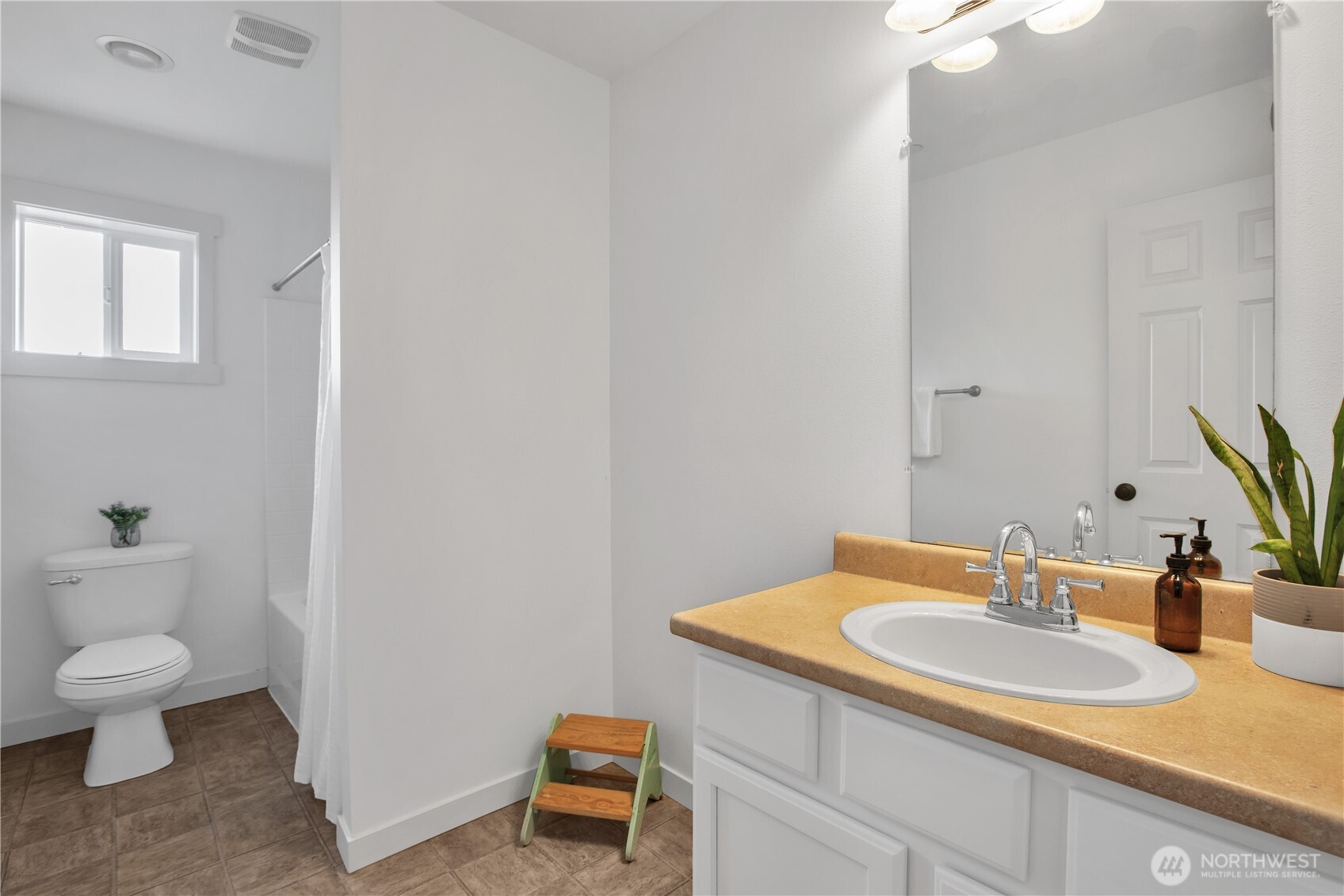 1344 Foreman Road DuPont, WA 98327 - Photo 28 of 40 a bathroom with a sink and a toilet