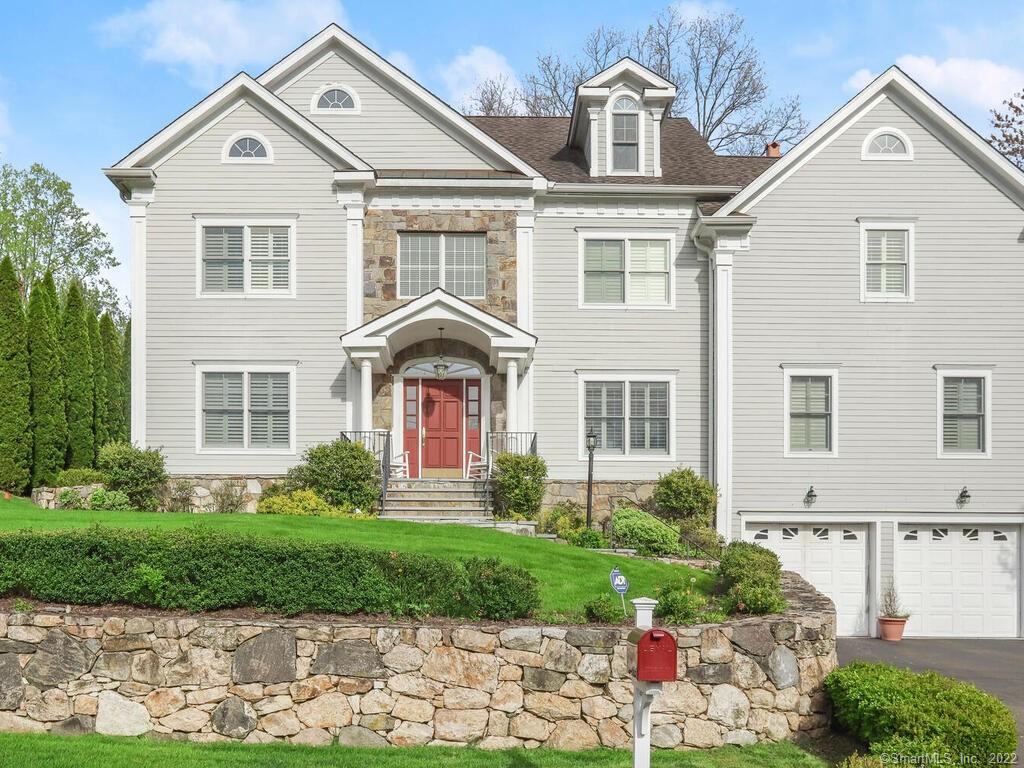 181 Club Road Stamford, CT 06905 - Photo 1 of 1 a front view of a house with garden