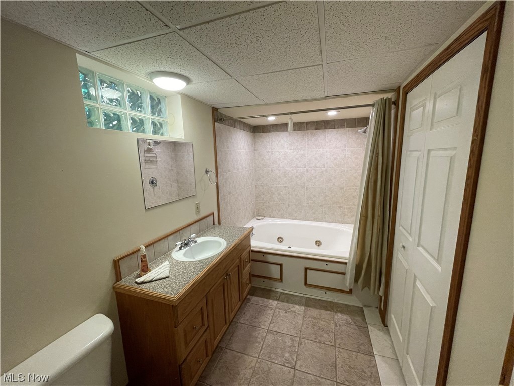 3268 Morewood Road Akron, OH 44333 - Photo 19 of 29 Full bathroom with shower / tub and tile flooring