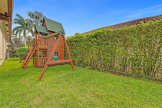 a outdoor space with patio the couches and a dining table with garden view