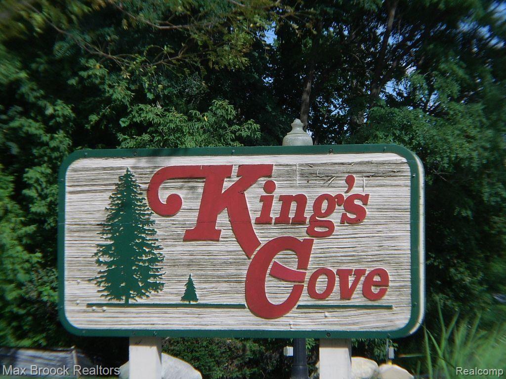 1197 Pine Ridge Court, Unit 129 Rochester, MI 48306 - Photo 5 of 23 Kings Cove entrance sign.jpg