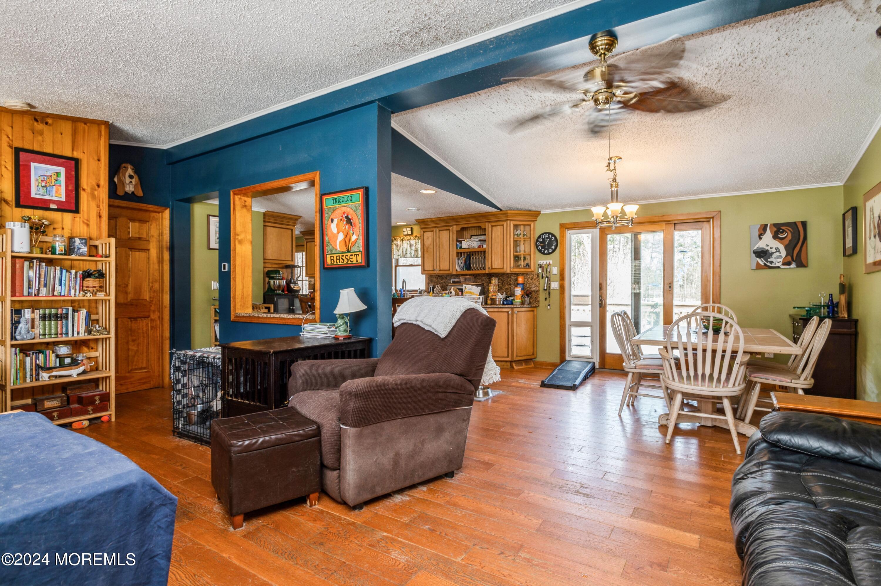 151 Cassville Road Jackson, NJ 08527 - Photo 3 of 14 a living room with furniture and a floor to ceiling window