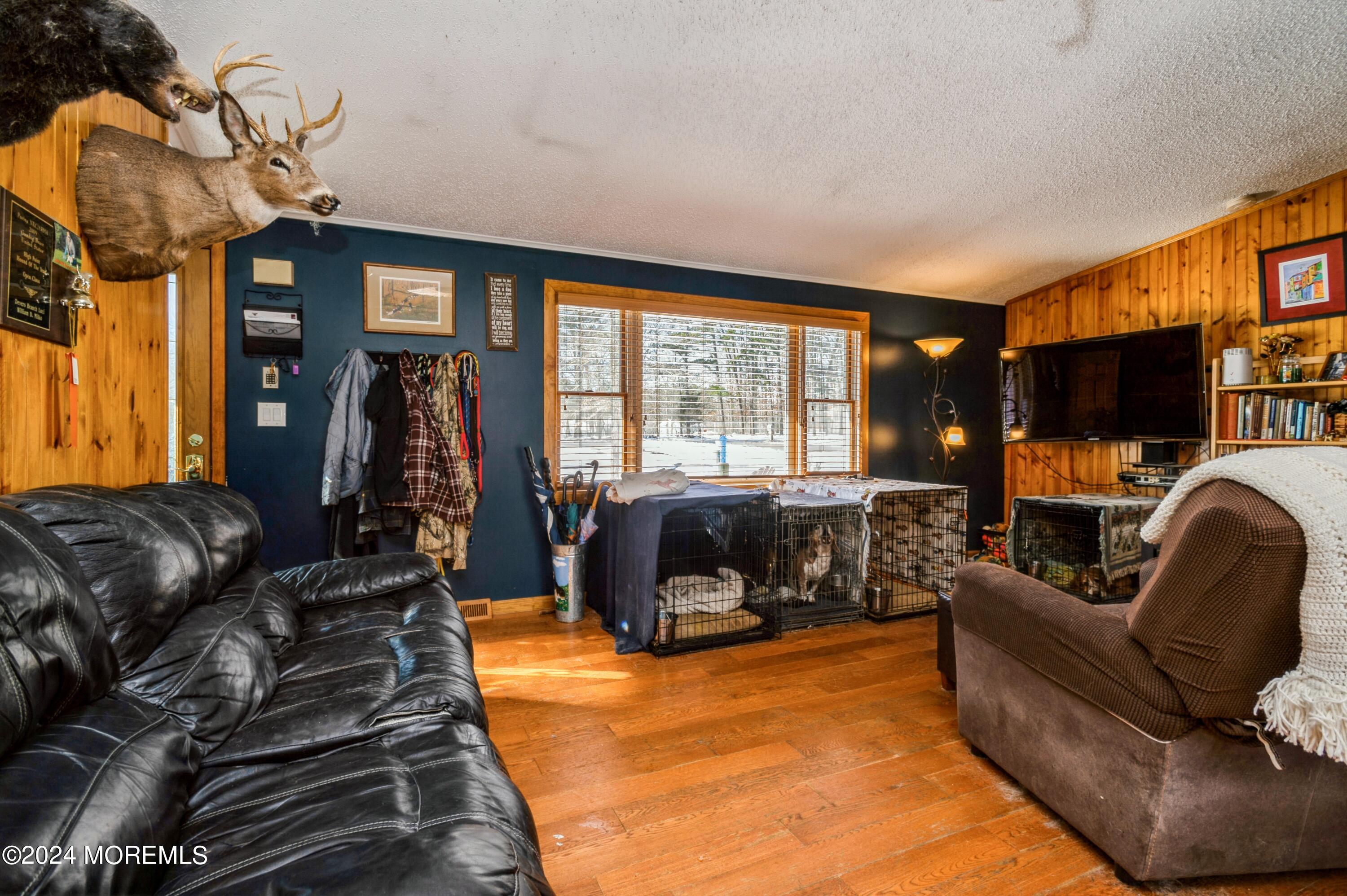151 Cassville Road Jackson, NJ 08527 - Photo 4 of 14 a living room with furniture and a large window