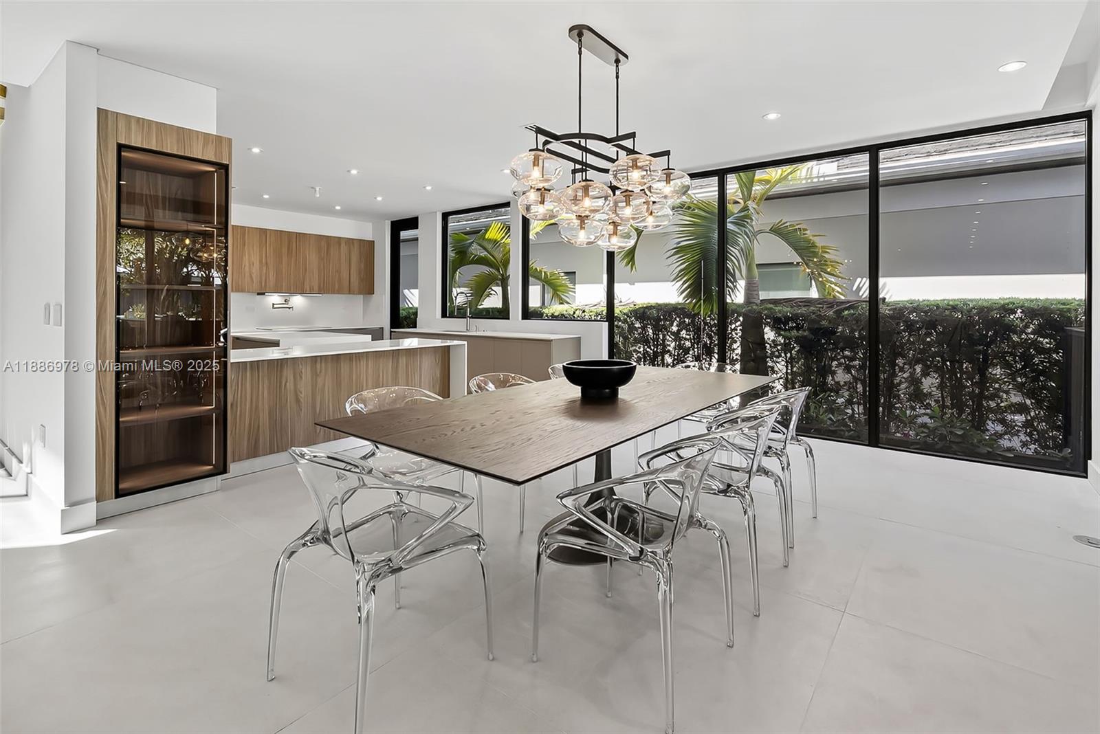 620 Solar Isle Drive Fort Lauderdale, FL 33301 - Photo 30 of 83 a view of a dining room with furniture window and outside view