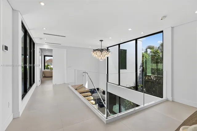 a view of a balcony with potted plants