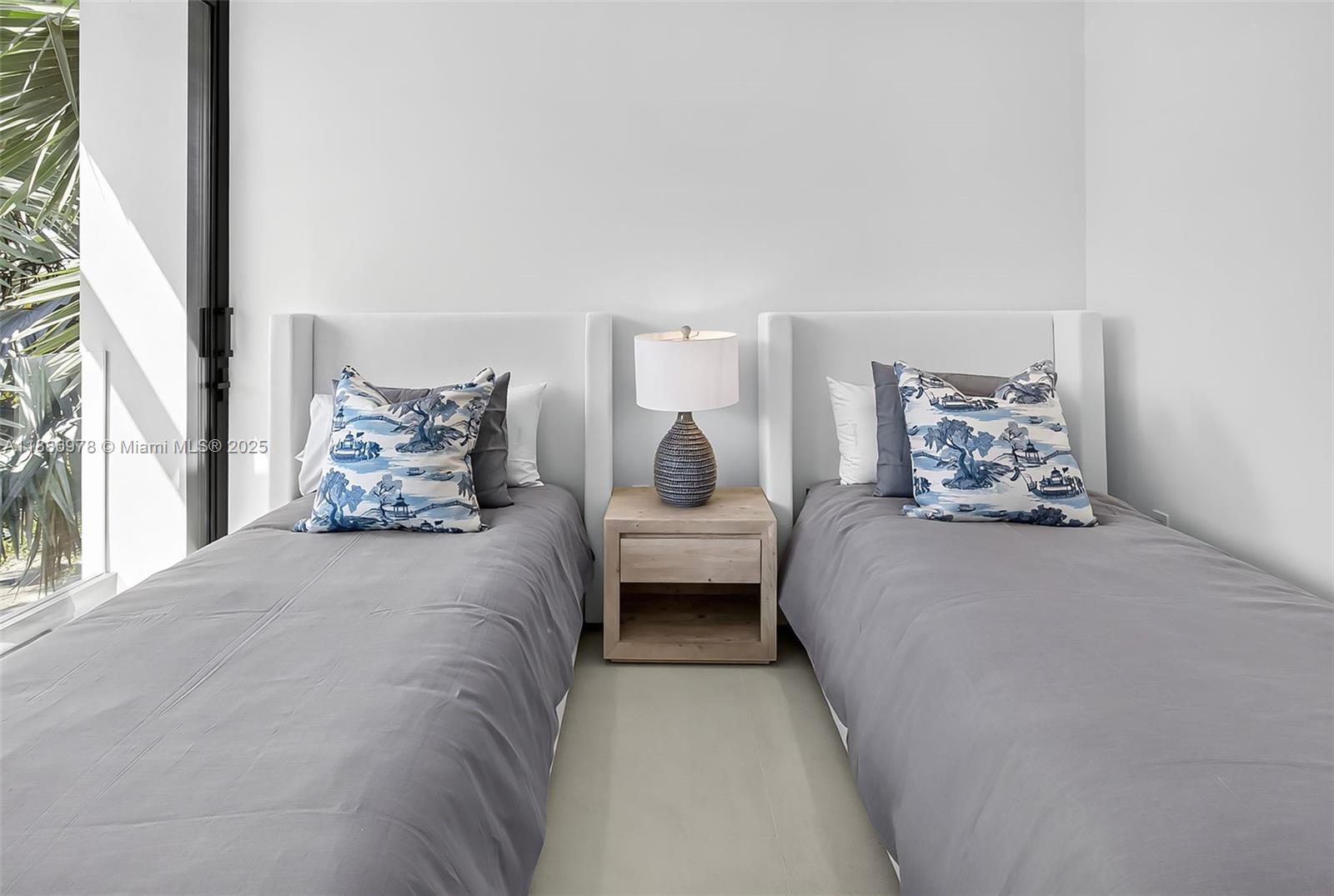 620 Solar Isle Drive Fort Lauderdale, FL 33301 - Photo 58 of 83 a bedroom with a bed and window