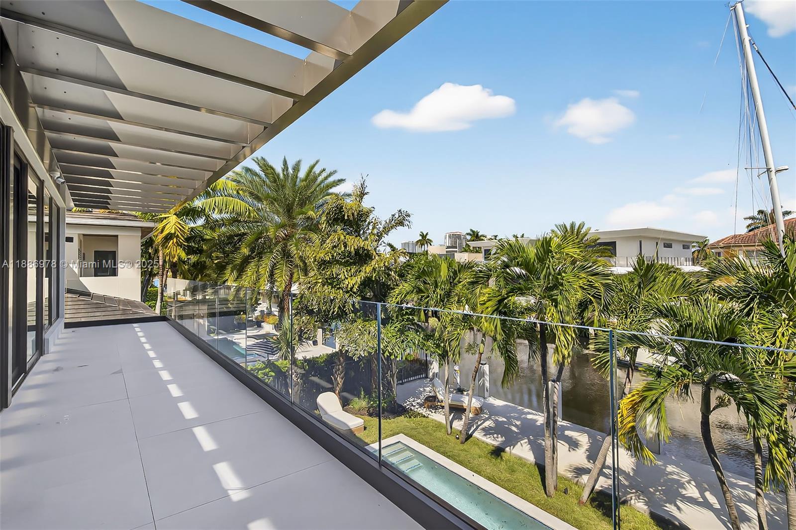 620 Solar Isle Drive Fort Lauderdale, FL 33301 - Photo 69 of 83 a view of a balcony with potted plants