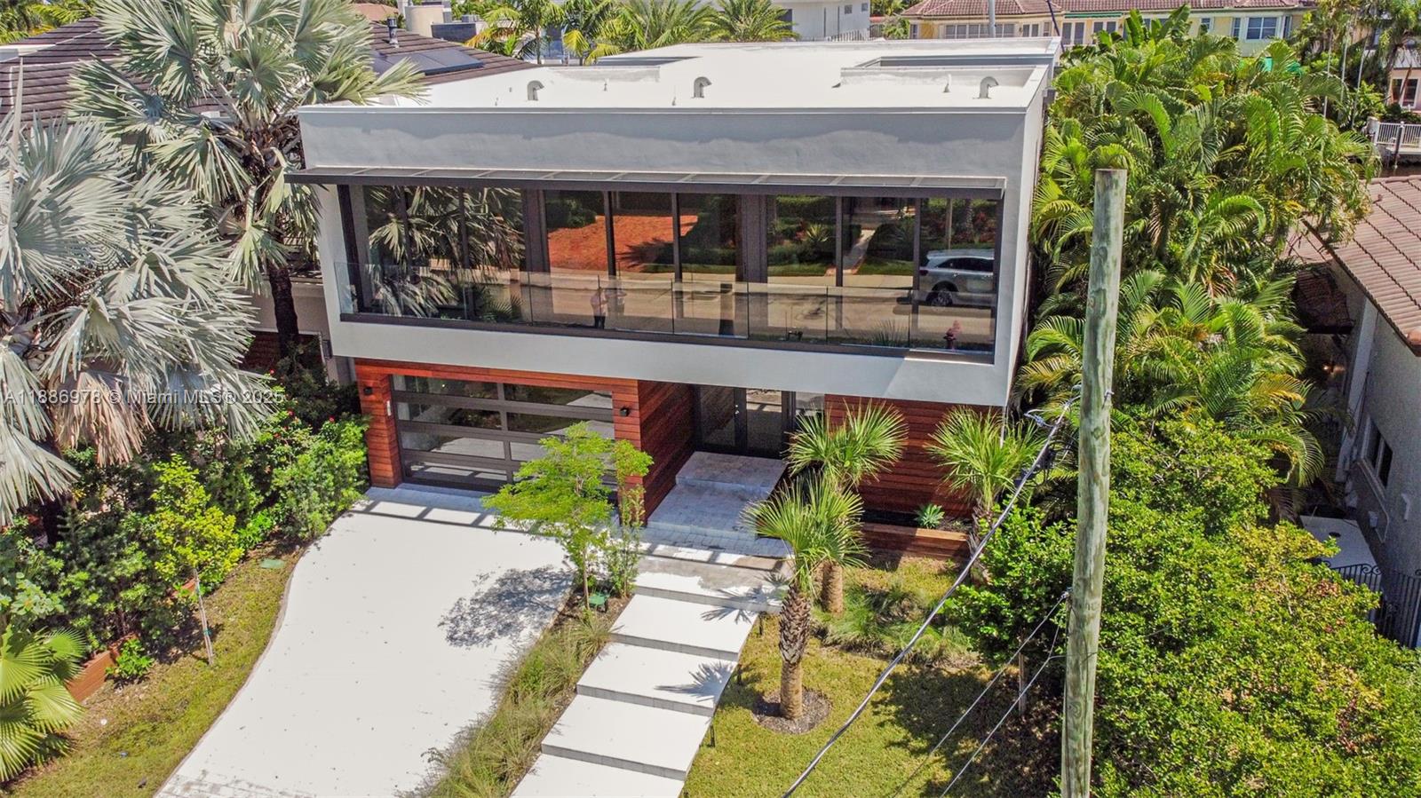 620 Solar Isle Drive Fort Lauderdale, FL 33301 - Photo 83 of 83 an aerial view of a house with garden and patio