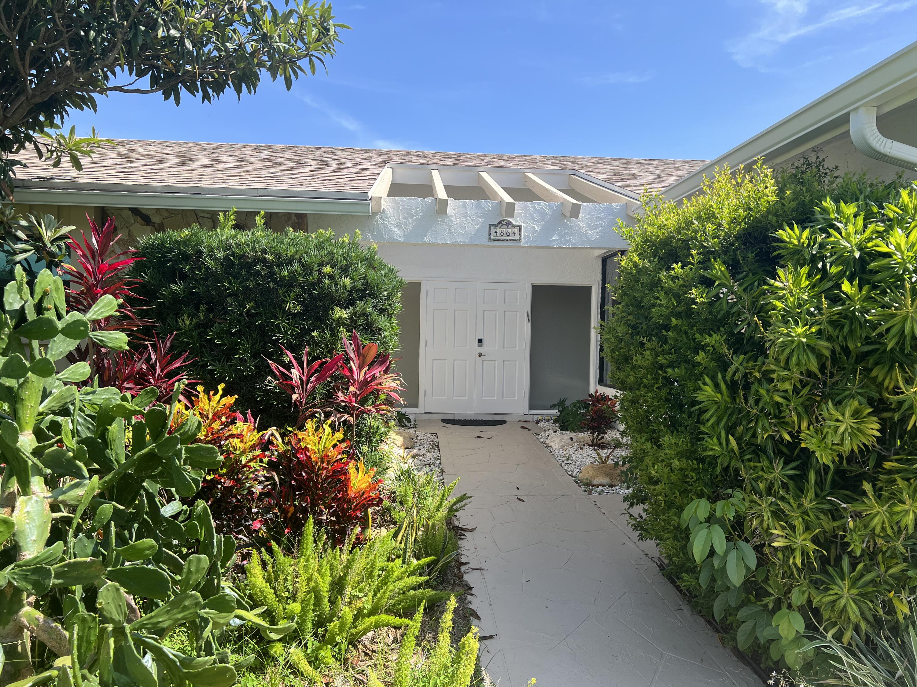 4864 Sugar Pine Drive Boca Raton, FL 33487 - Photo 3 of 22 5576FBF2-D2E4-4744-B2E5-8B9CAC21AFE7