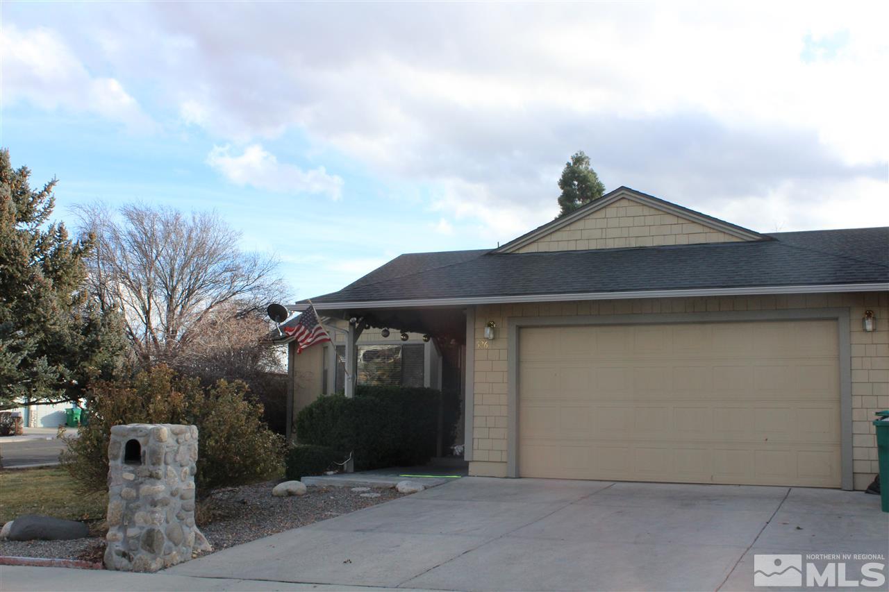 526 Citadel Road Reno, NV 89503 - Photo 1 of 22 a front view of a house with garden