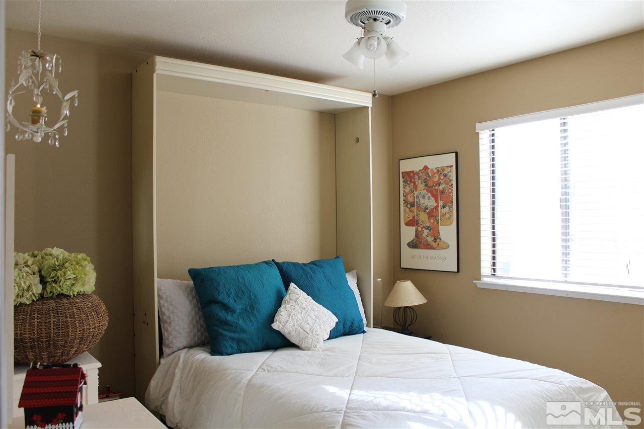 526 Citadel Road Reno, NV 89503 - Photo 14 of 22 a bedroom with a bed and a window