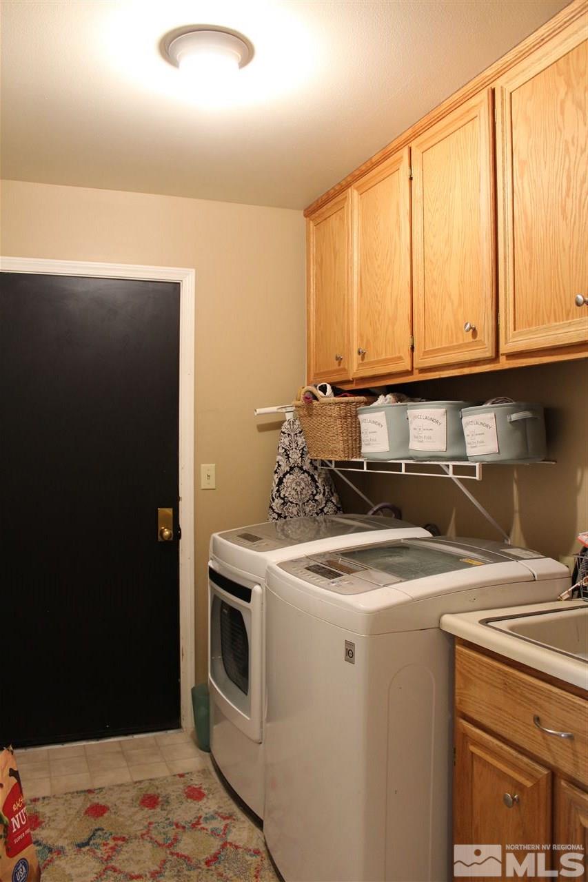 526 Citadel Road Reno, NV 89503 - Photo 18 of 22 a utility room with dryer and washer