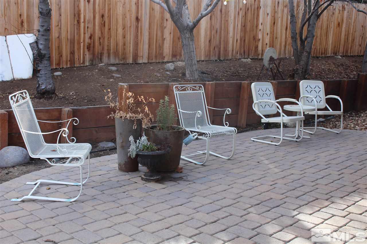 526 Citadel Road Reno, NV 89503 - Photo 20 of 22 a view of a chairs and table in backyard