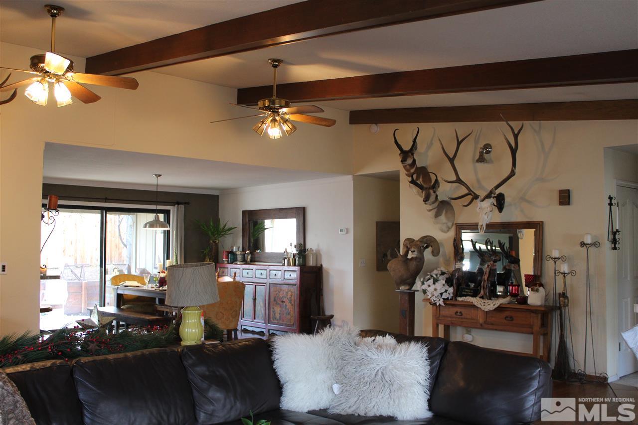 526 Citadel Road Reno, NV 89503 - Photo 7 of 22 a view of a livingroom with furniture and a chandelier