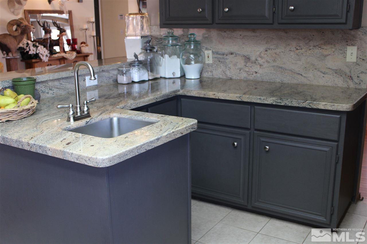 526 Citadel Road Reno, NV 89503 - Photo 9 of 22 a kitchen with a sink and cabinets