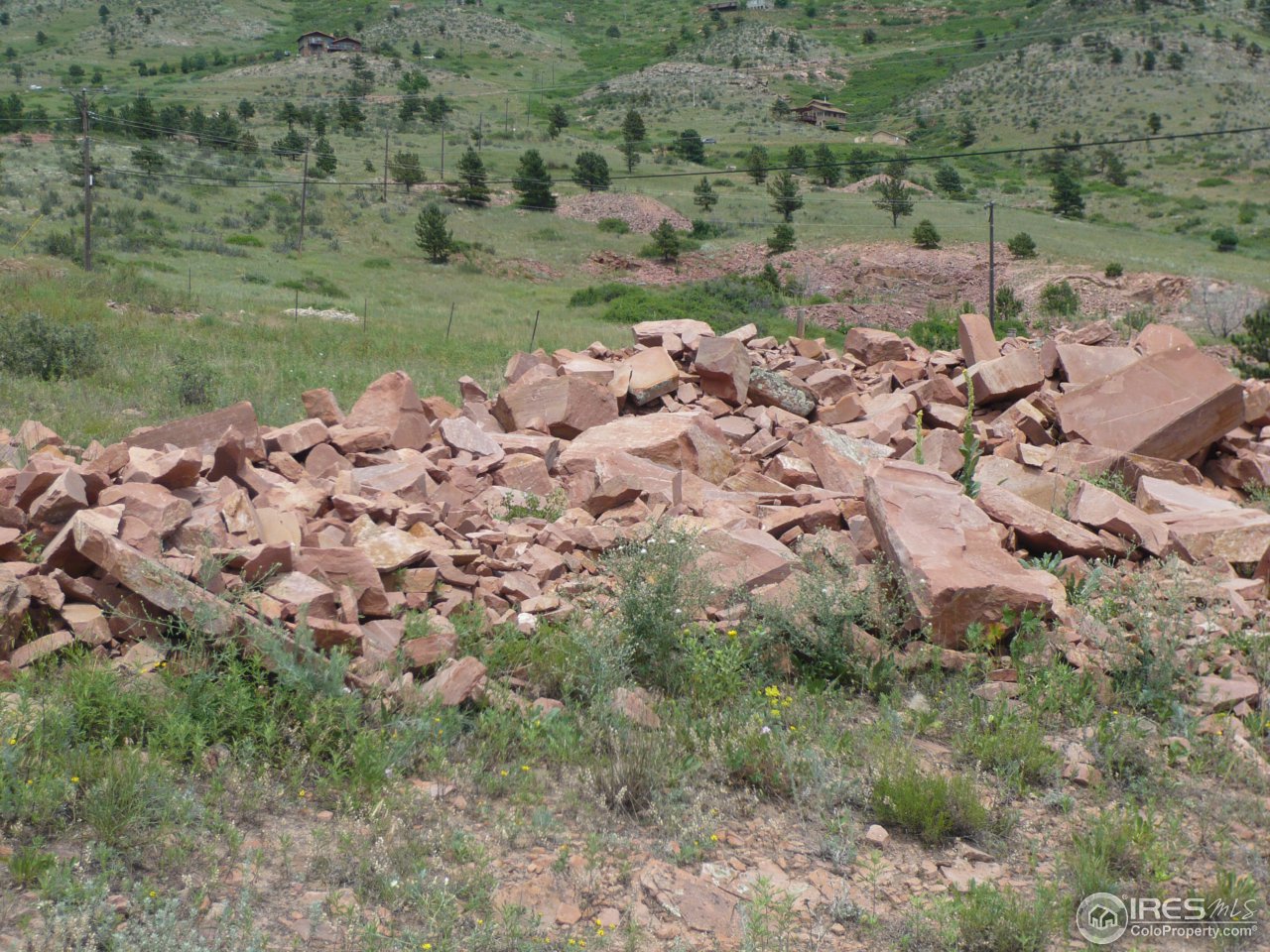 452 Steamboat Valley Road Lyons, CO 80540 - Photo 4 of 25 Flagstone pile on side of Driveway