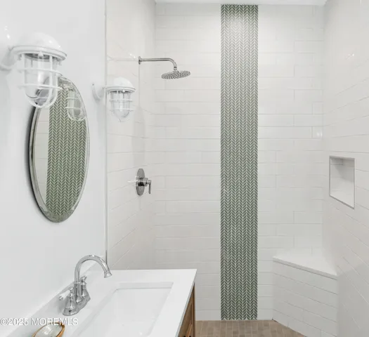 a living room with a flat screen tv and a couch