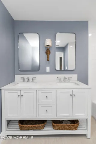 a bedroom with a bed and dresser